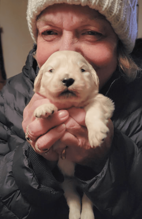 Jan holding pup 1